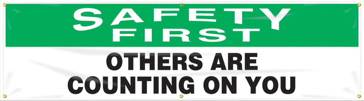 4" X 96" Green, Black And White Reinforced Flexible Poly Sheeting Safety Banner "SAFETY FIRST OTHER ARE COUNTING ON YOU"